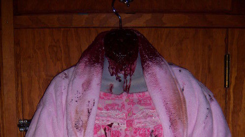 A headless zombie costume I made to wear later this year. It is rigged to squirt blood out of the neck.