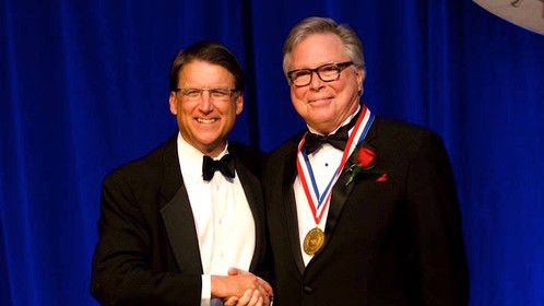 Ira David Wood III receiving the NC Award, the highest civilian award presented by the State of North Carolina on November 13, 2014.  Mr. Wood is pictured with NC Governor, Pat McCrory