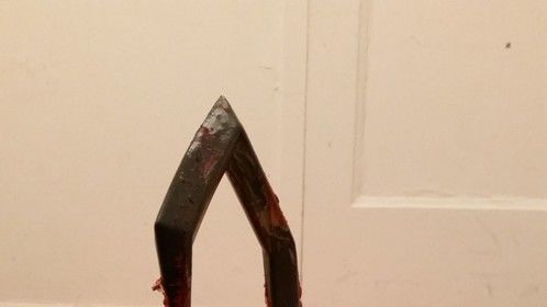 A bloody hook for a costume 