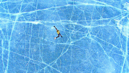 &quot;Kate Skates&quot; - Aerial view of &quot;TSUNA&quot; skating on Lake of the Isles.