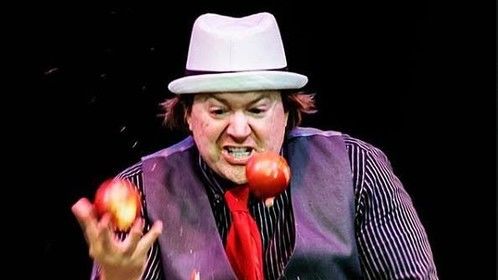 Brian Pankey AKA The Apple Biting Juggler performs in a theatrical production