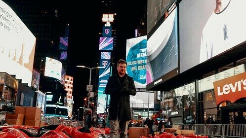 Traversing times square on the set of &quot;The World's Big Sleepout&quot;