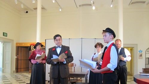 The costumes for this Readers Theatre of O Henry's story were B&W w/ red.