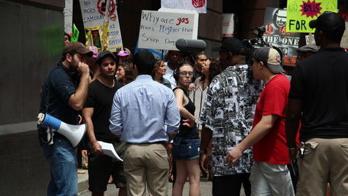 Filming protest scene in downtown Chicago